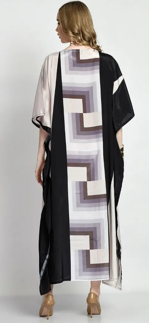 Model in Vicharan EARTHBOUND Beige & Black Kaftan zoomed in from back